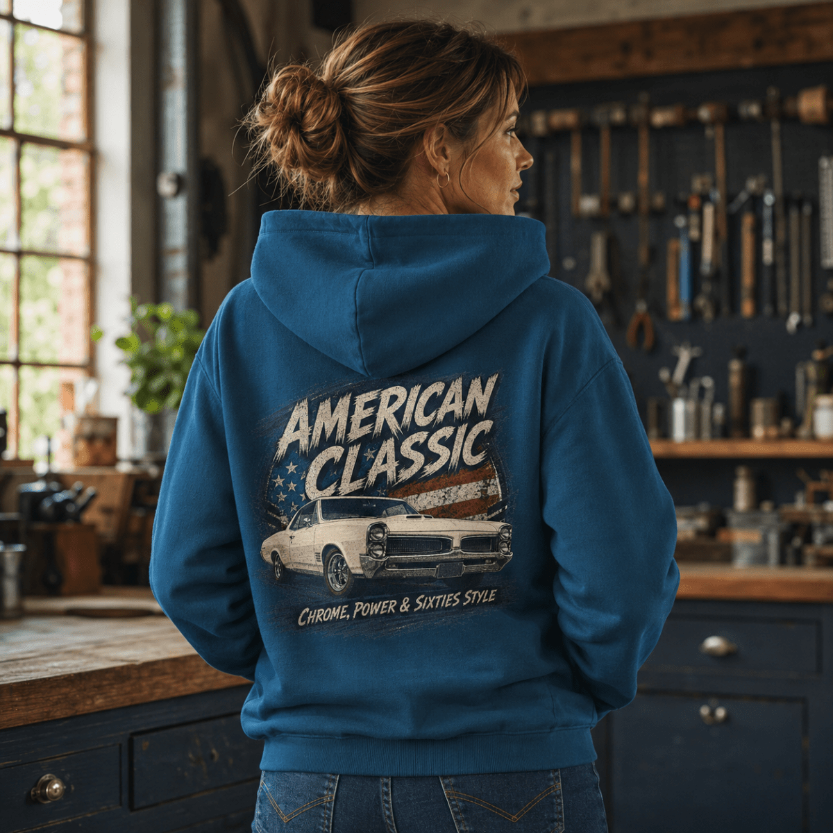 Model wearing a sapphire blue white muscle coupe graphic hoodie, back print view