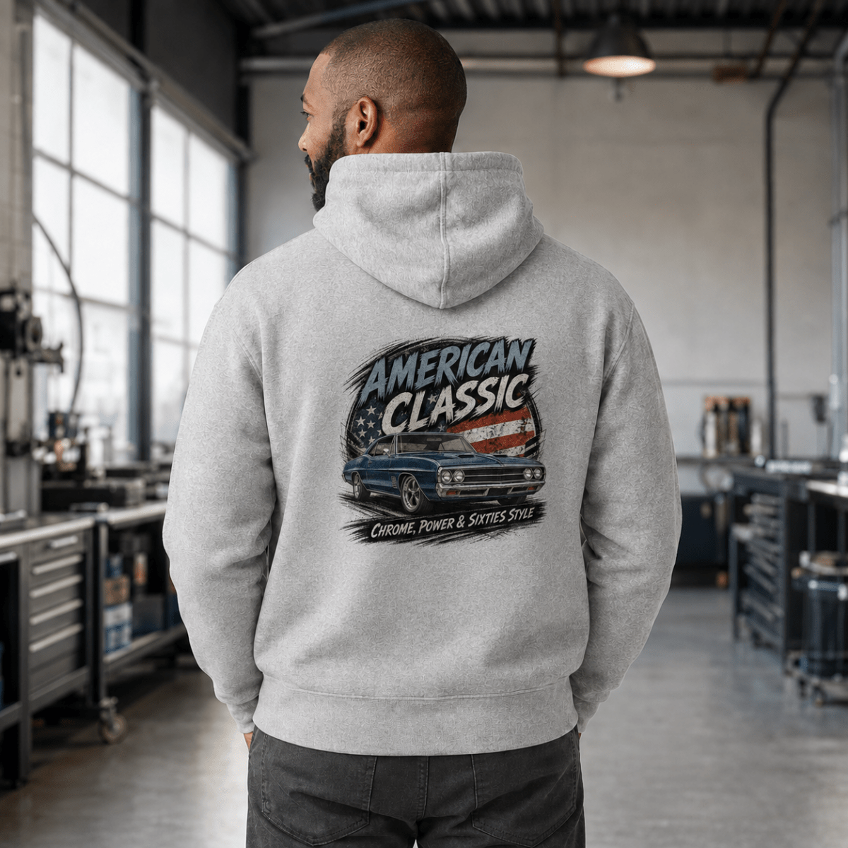 Model wearing a sport grey blue street machine graphic hoodie, back print view