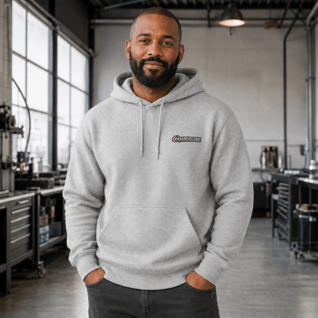 Front view of model wearing the sport grey Camberline hoodie with chest logo