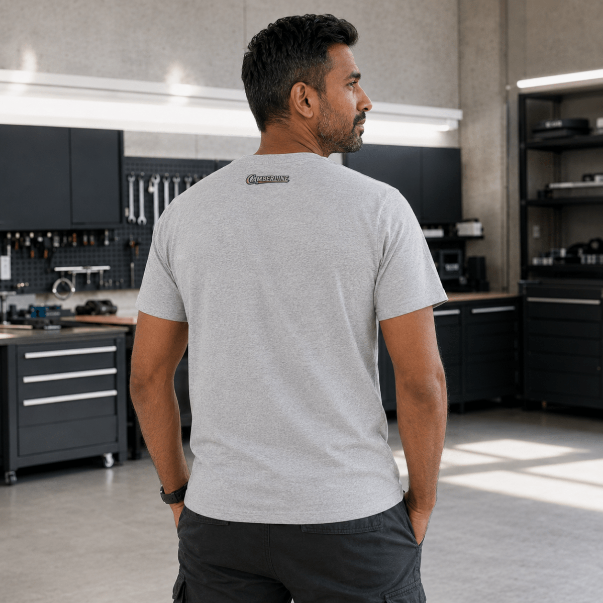 Back view of model wearing the sport grey Camberline T-shirt with nape print