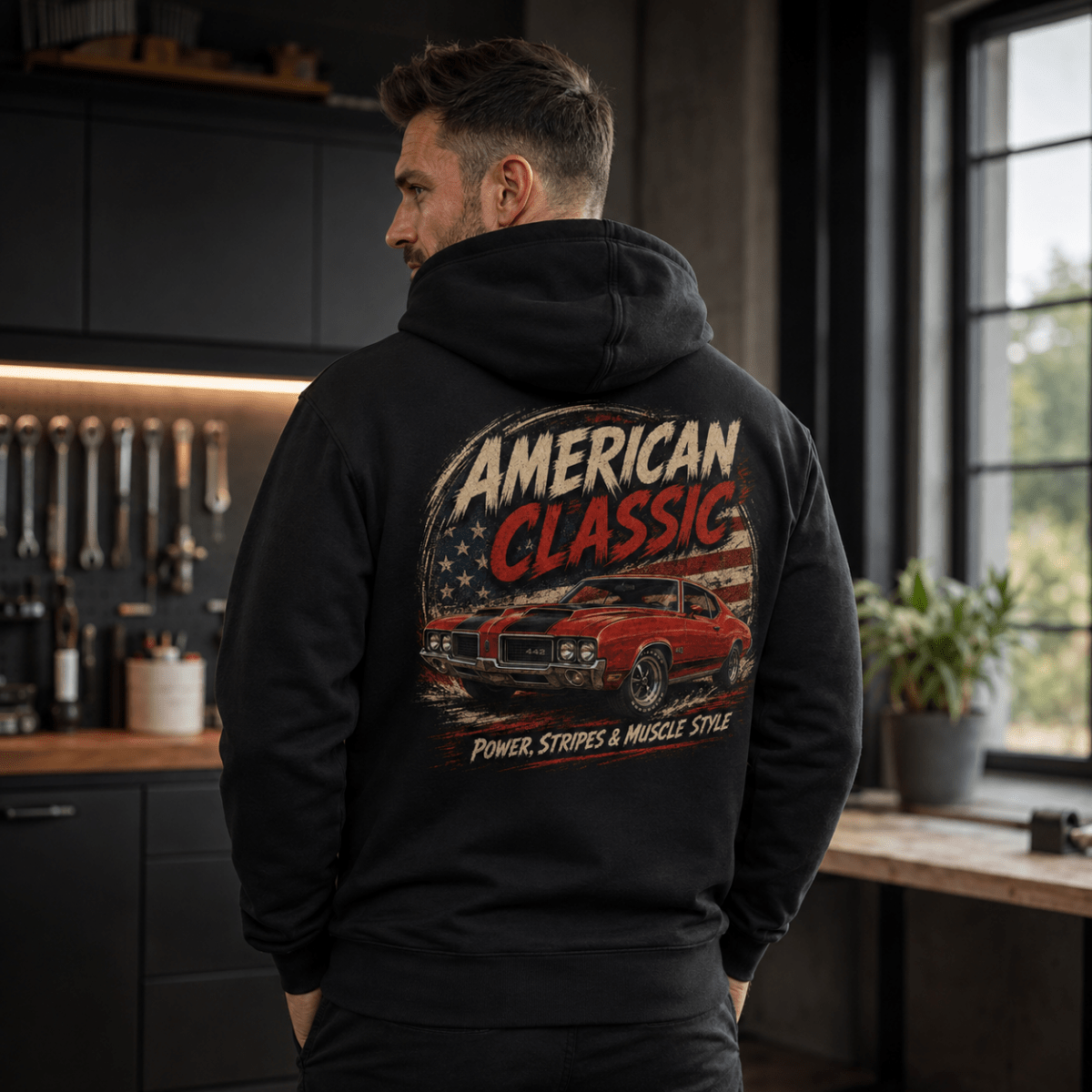 Model wearing a black red sports coupe graphic hoodie, back print view
