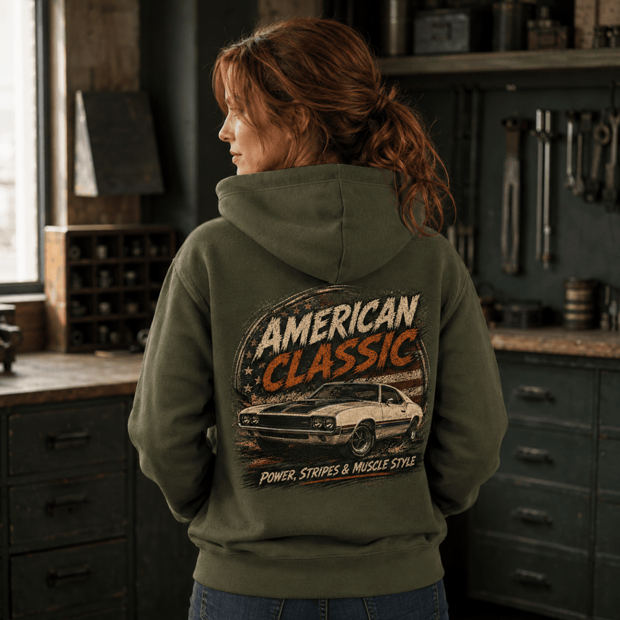 Model wearing a military green hardtop muscle car graphic hoodie, back print view