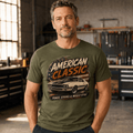 Model wearing a military green hardtop muscle car graphic T-shirt, front view