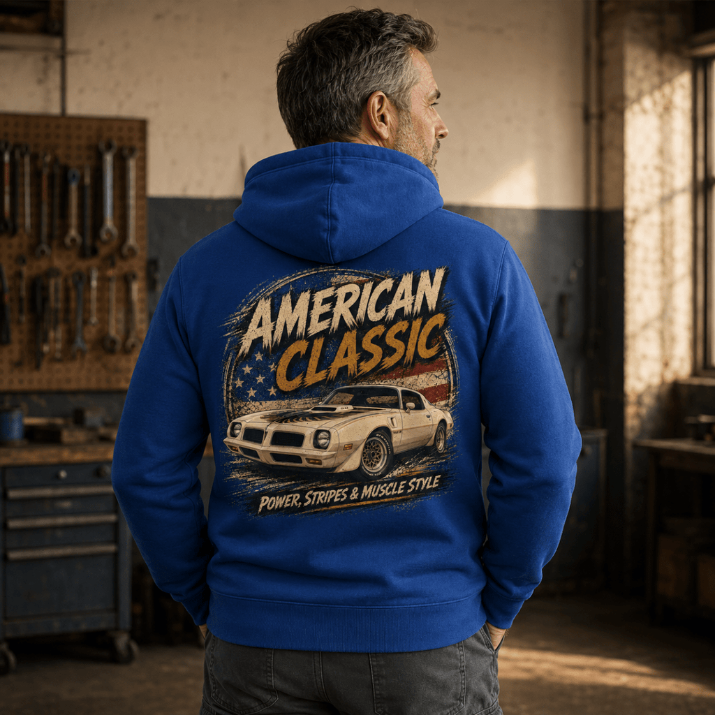 Model wearing a royal blue T/A 6.6 muscle car graphic hoodie, back print view