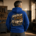 Model wearing a royal blue T/A 6.6 muscle car graphic hoodie, back print view