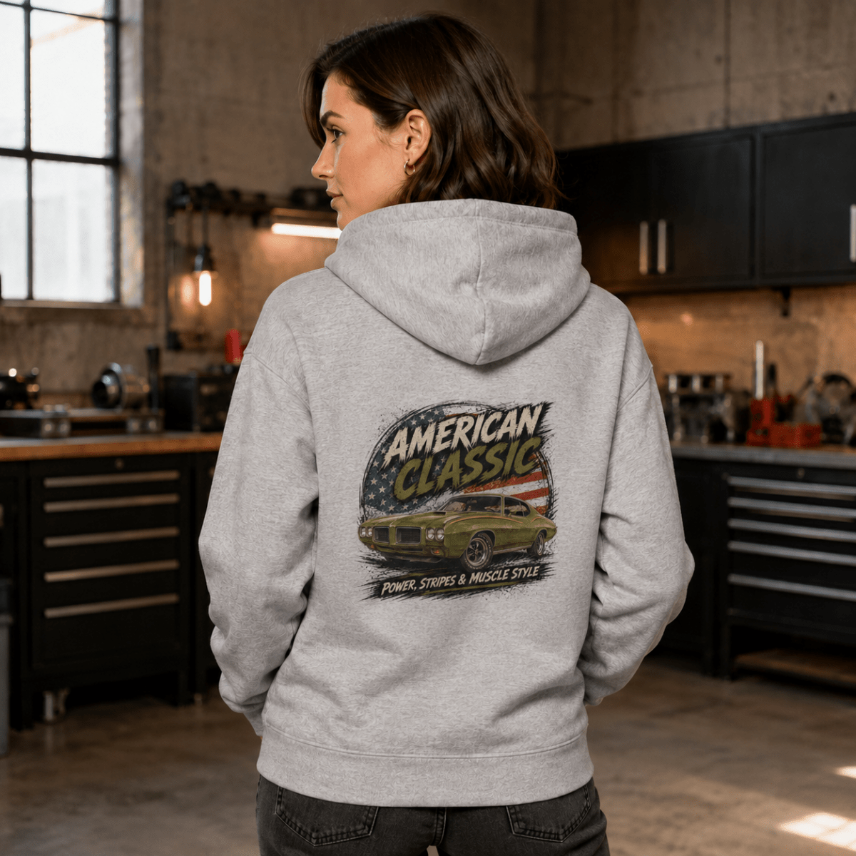 Model wearing a sport grey green striped muscle coupe graphic hoodie, back print view