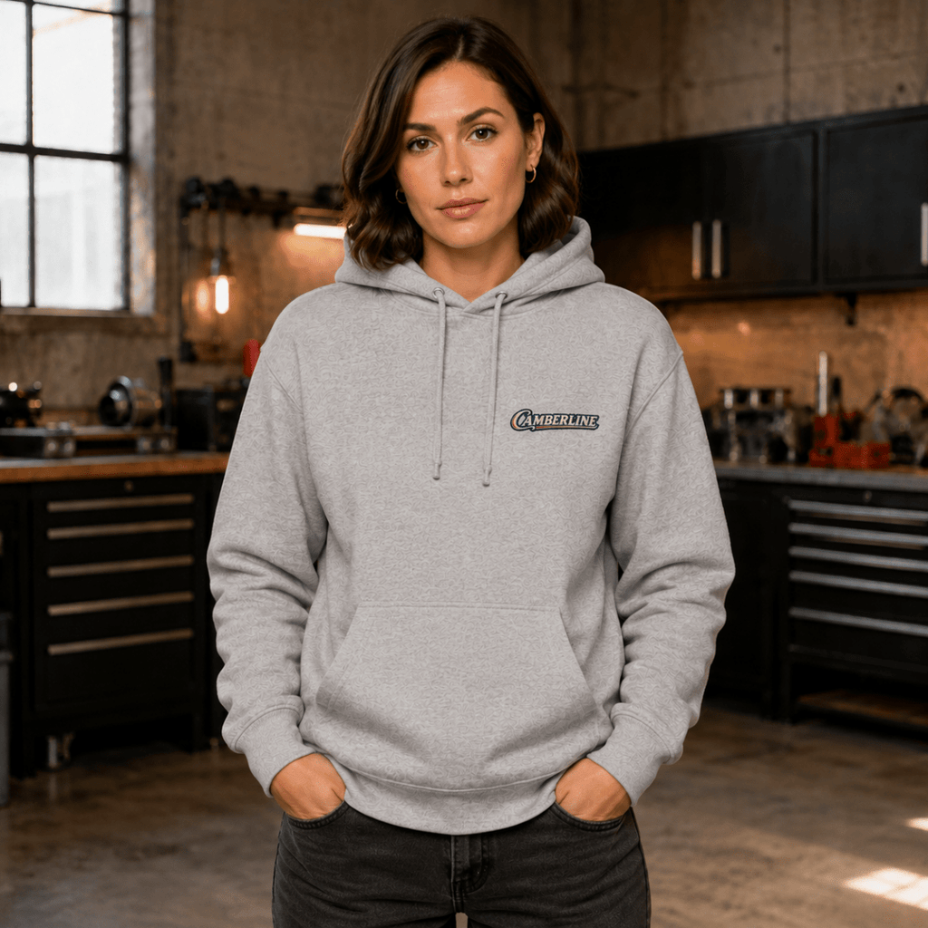 Front view of model wearing the sport grey Camberline hoodie with chest logo