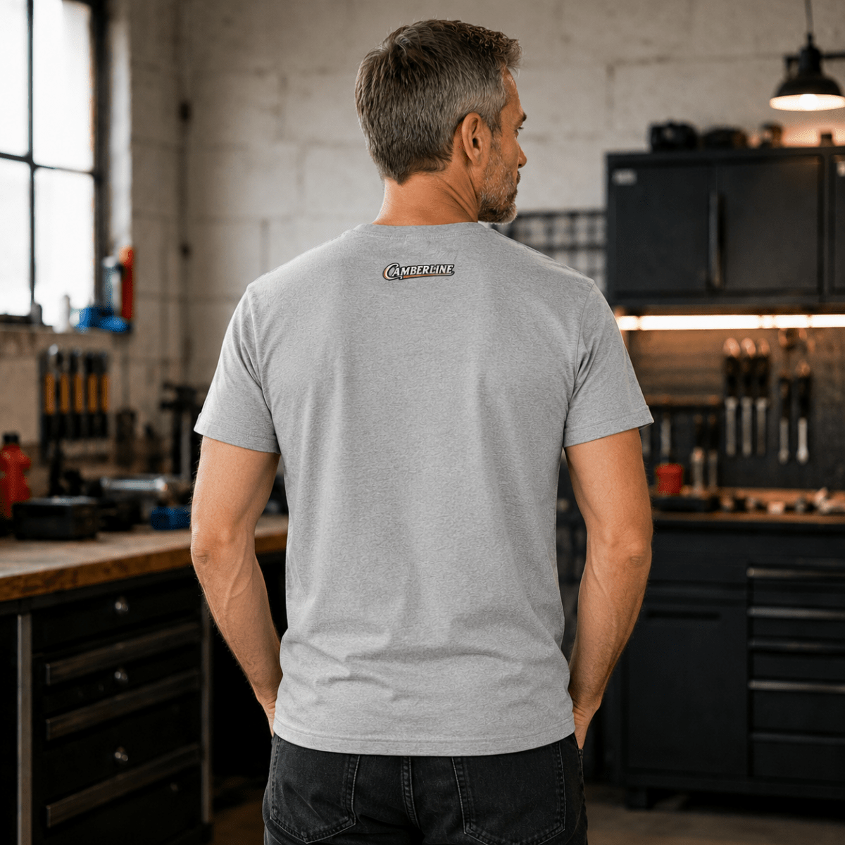 Back view of model wearing the sport grey Camberline T-shirt with nape print