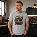 Model wearing a sport grey green striped muscle coupe graphic T-shirt, front view