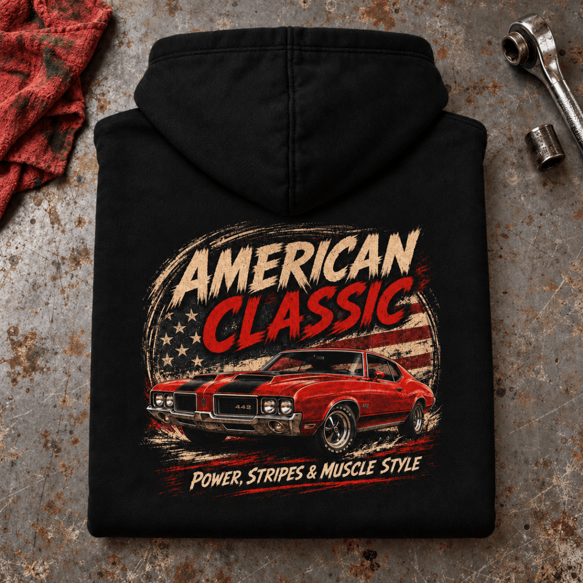 American Classic 1970s Red Sports Coupe Graphic Hoodie – Black, folded back hero on a worn automotive workbench – car-hd-0139