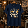 Navy Skyboss AN-2 biplane T-shirt in a gritty vintage aircraft workshop