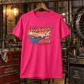 Hot pink Widebody trijet aviation T-shirt in a gritty vintage aircraft workshop