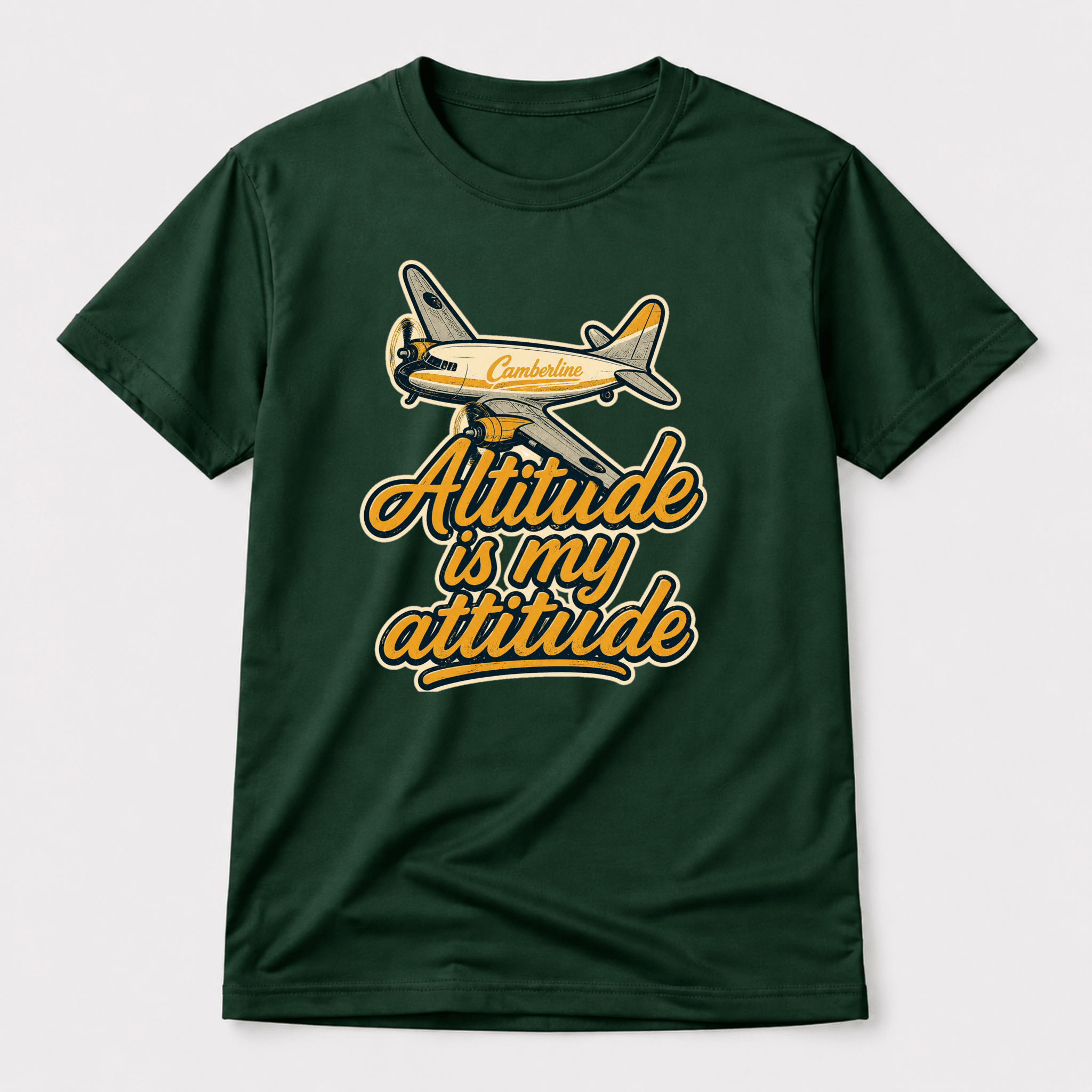 Green t-shirt with airplane graphic and 'Attitude is my attitude' text on a white background