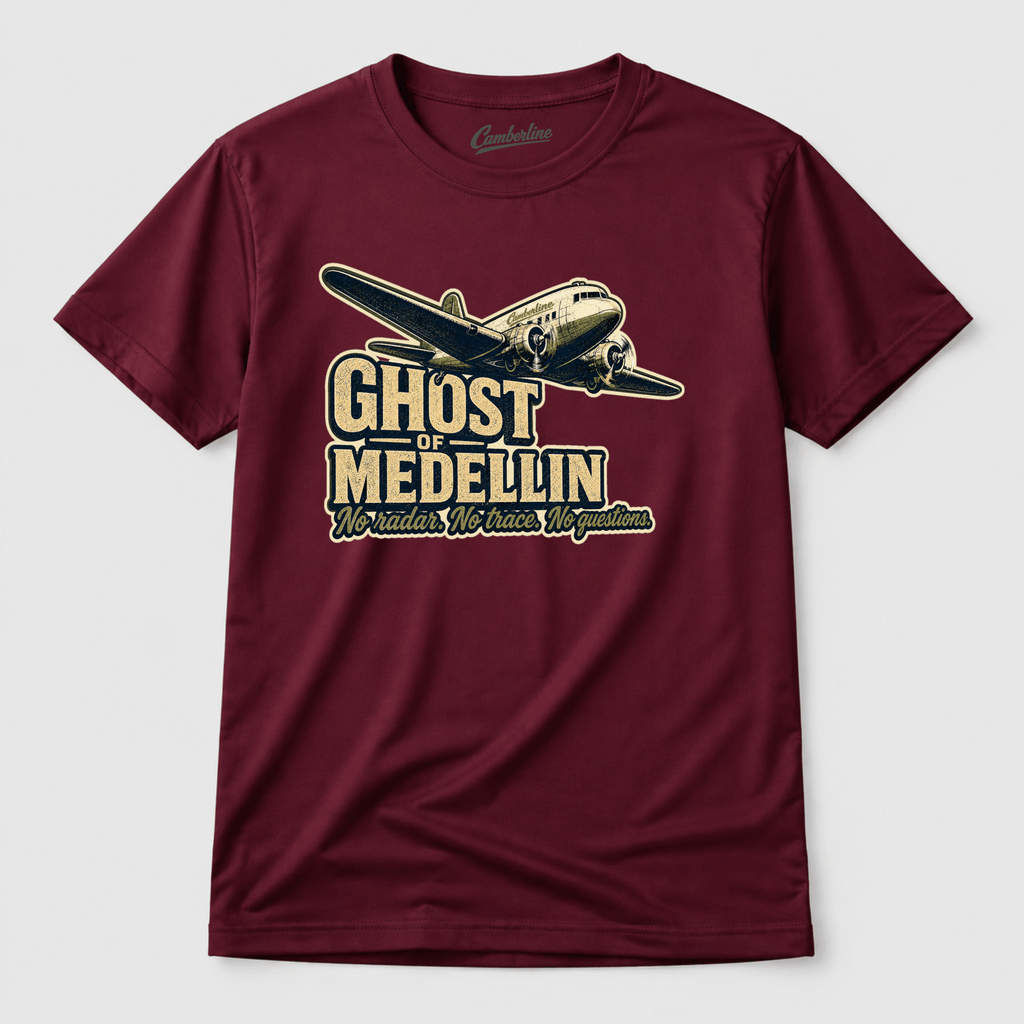 Maroon t-shirt with airplane graphic and 'Ghost of Medellin' text on a white background
