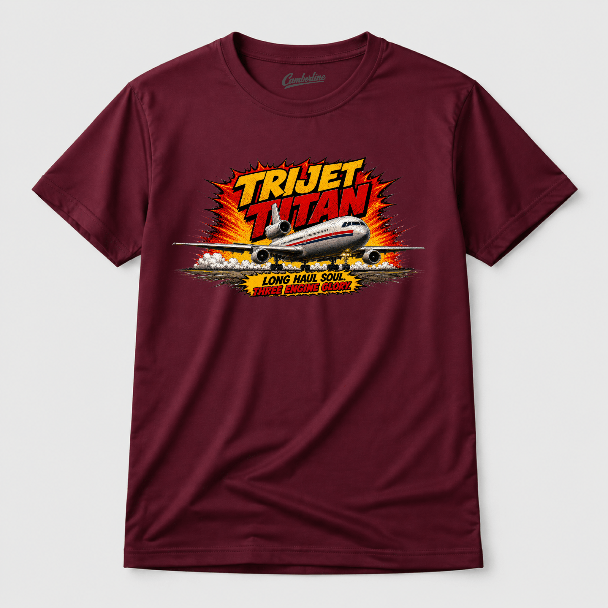 Maroon t-shirt with 'Trijet Titan' graphic design on a white background