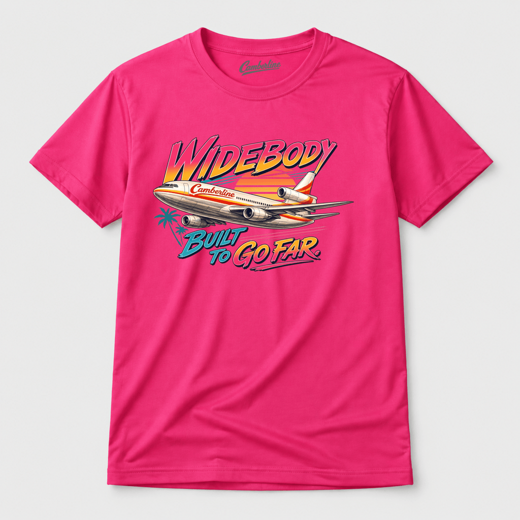 Pink t-shirt with airplane graphic and text on a white background