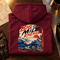Camberline Big Mile Energy luxury tourer burgundy hoodie back print in a premium touring setting