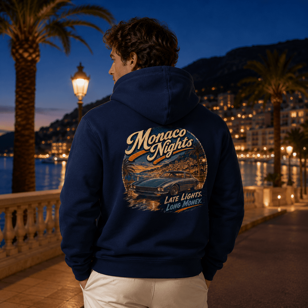 Model wearing the Camberline Cars Monaco Nights Classic Coupe Hoodie – Navy, styled in a car culture setting