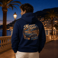 Model wearing the Camberline Cars Monaco Nights Classic Coupe Hoodie – Navy, styled in a car culture setting