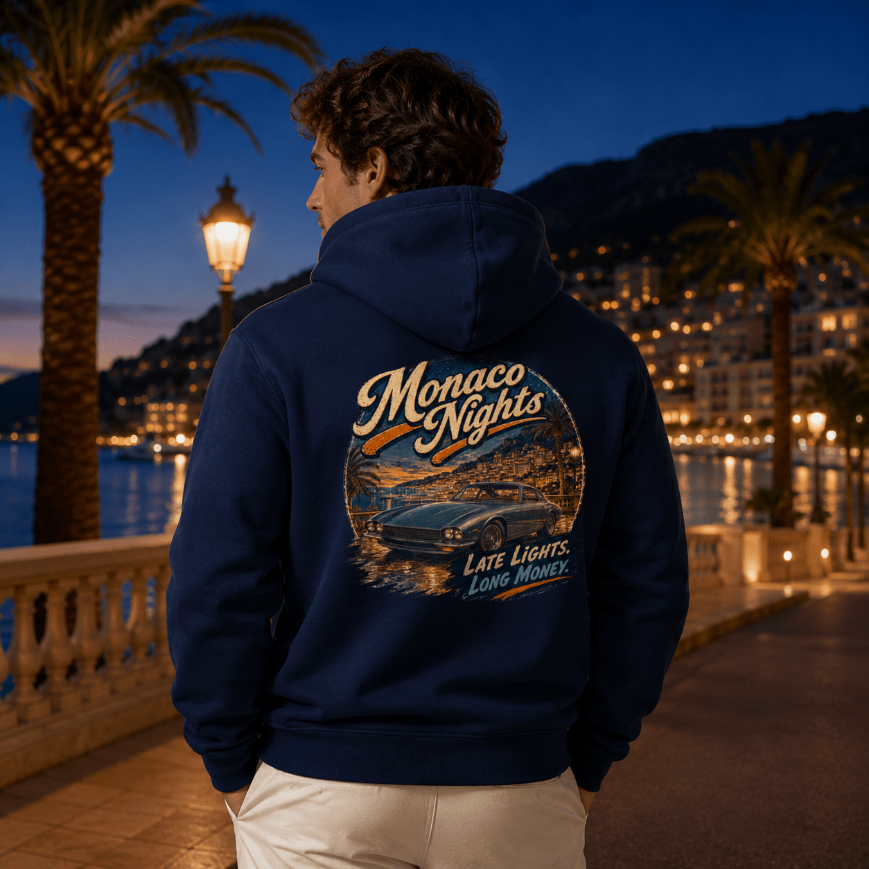 Model wearing the Camberline Cars Monaco Nights Classic Coupe Hoodie – Navy, styled in a car culture setting