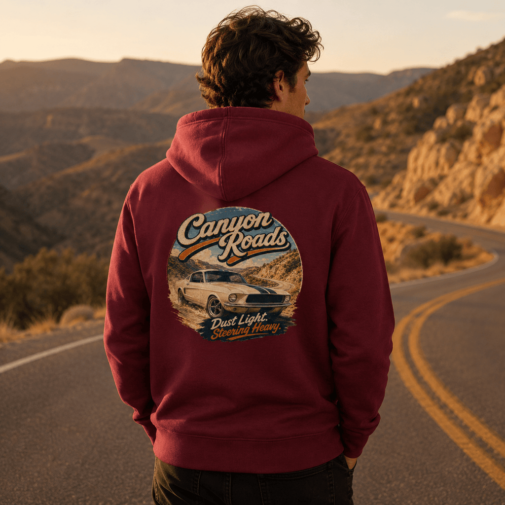 Model wearing Camberline Cars Canyon Roads Classic Muscle Hoodie in Burgundy, styled for car culture
