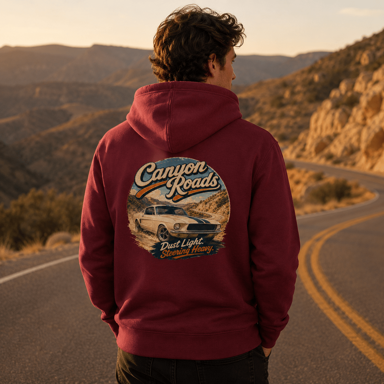 Model wearing Camberline Cars Canyon Roads Classic Muscle Hoodie in Burgundy, styled for car culture