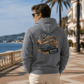 Model wearing Camberline Cars Cote D'Azur Classic Coupe Hoodie in Storm Grey, styled for car culture
