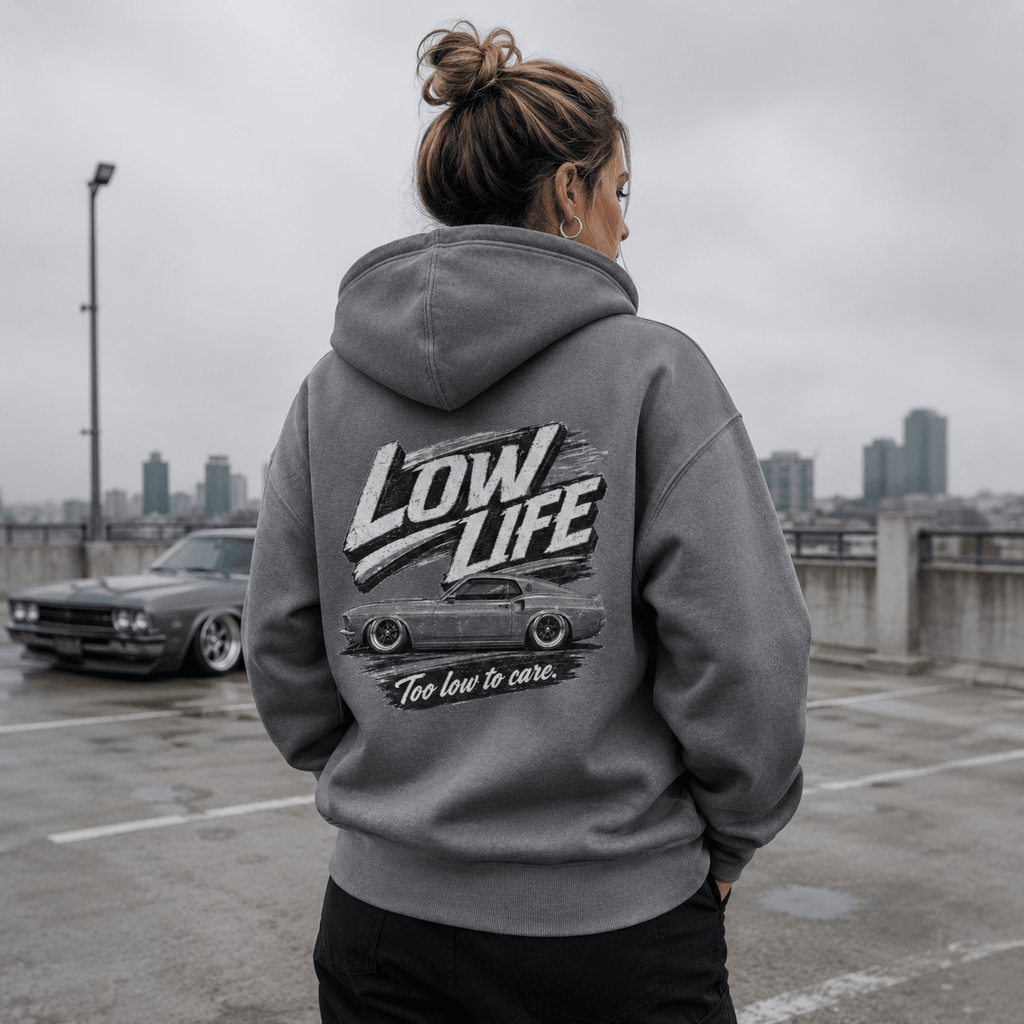 Model wearing Camberline Cars Low Life Monochrome Hoodie in Heather Grey, styled for car culture