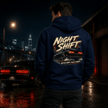 Model wearing the Camberline Cars Night Shift Muscle Car Hoodie – Navy, styled in a car culture setting