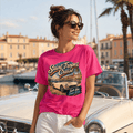 Model wearing the Camberline Cars Saint Tropez Cruise Classic Roadster T-Shirt – Hot Pink, styled in a car culture setting