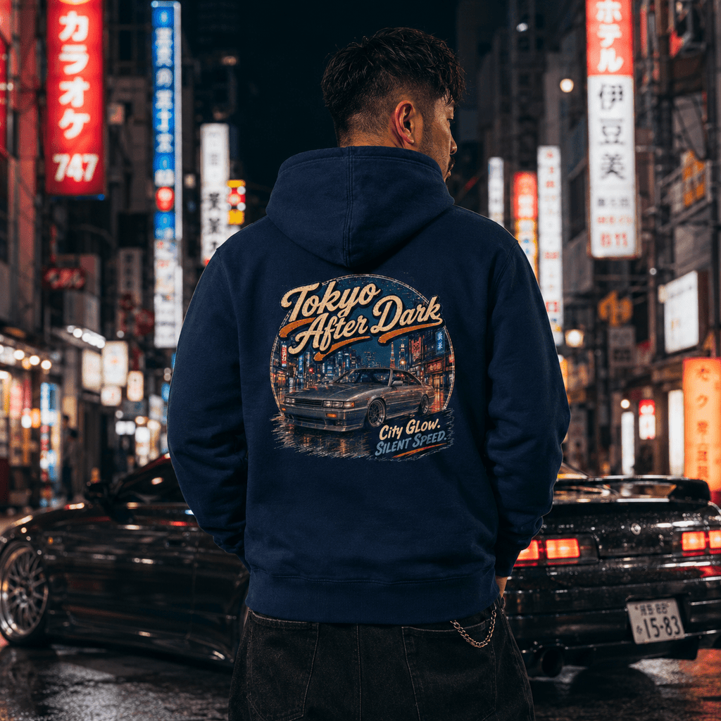 Model wearing the Camberline Cars Tokyo After Dark Drift Coupe Hoodie – Navy, styled in a car culture setting