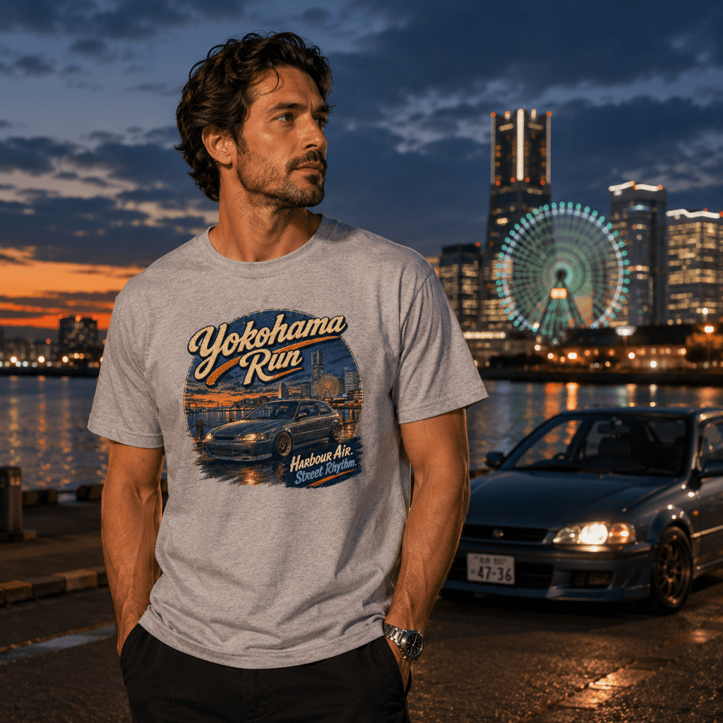 Model wearing the Camberline Cars Yokohama Run Hot Hatch T-Shirt – Sport Grey, showing the automotive graphic in a car culture setting