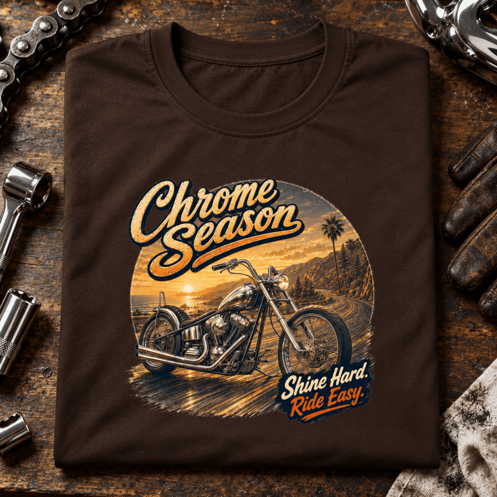 Camberline Chrome Season custom chopper brown T-shirt front print on a chrome bike-builder bench