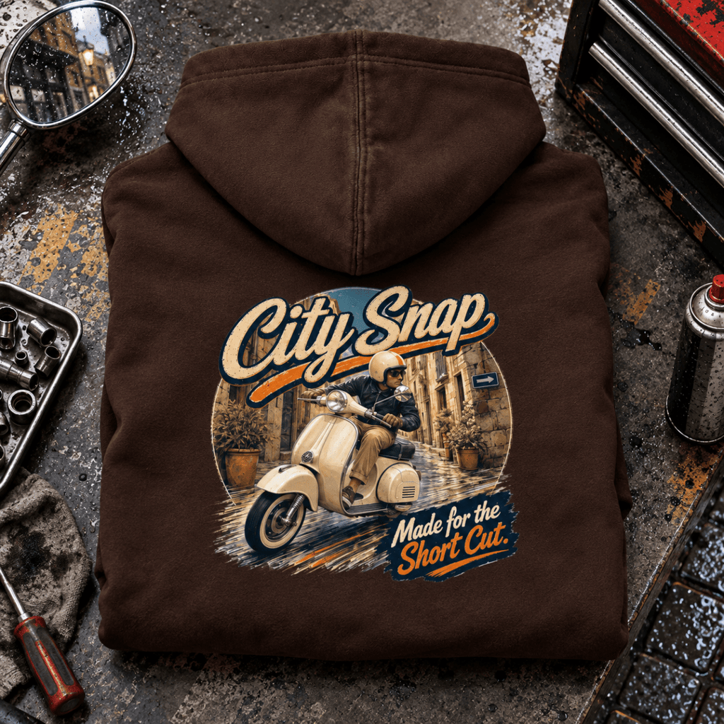 Camberline City Snap classic scooter brown hoodie back print in an urban workshop setting