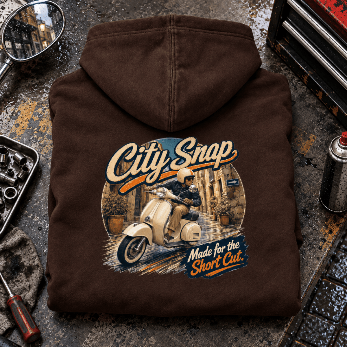 Camberline City Snap classic scooter brown hoodie back print in an urban workshop setting