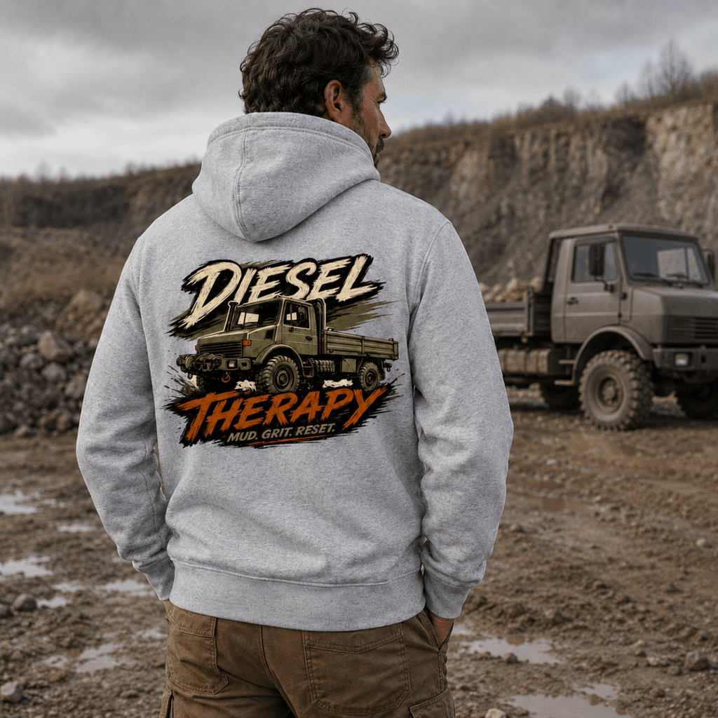 Person wearing a hoodie with a truck graphic and 'Diesel Therapy' text in an outdoor setting.