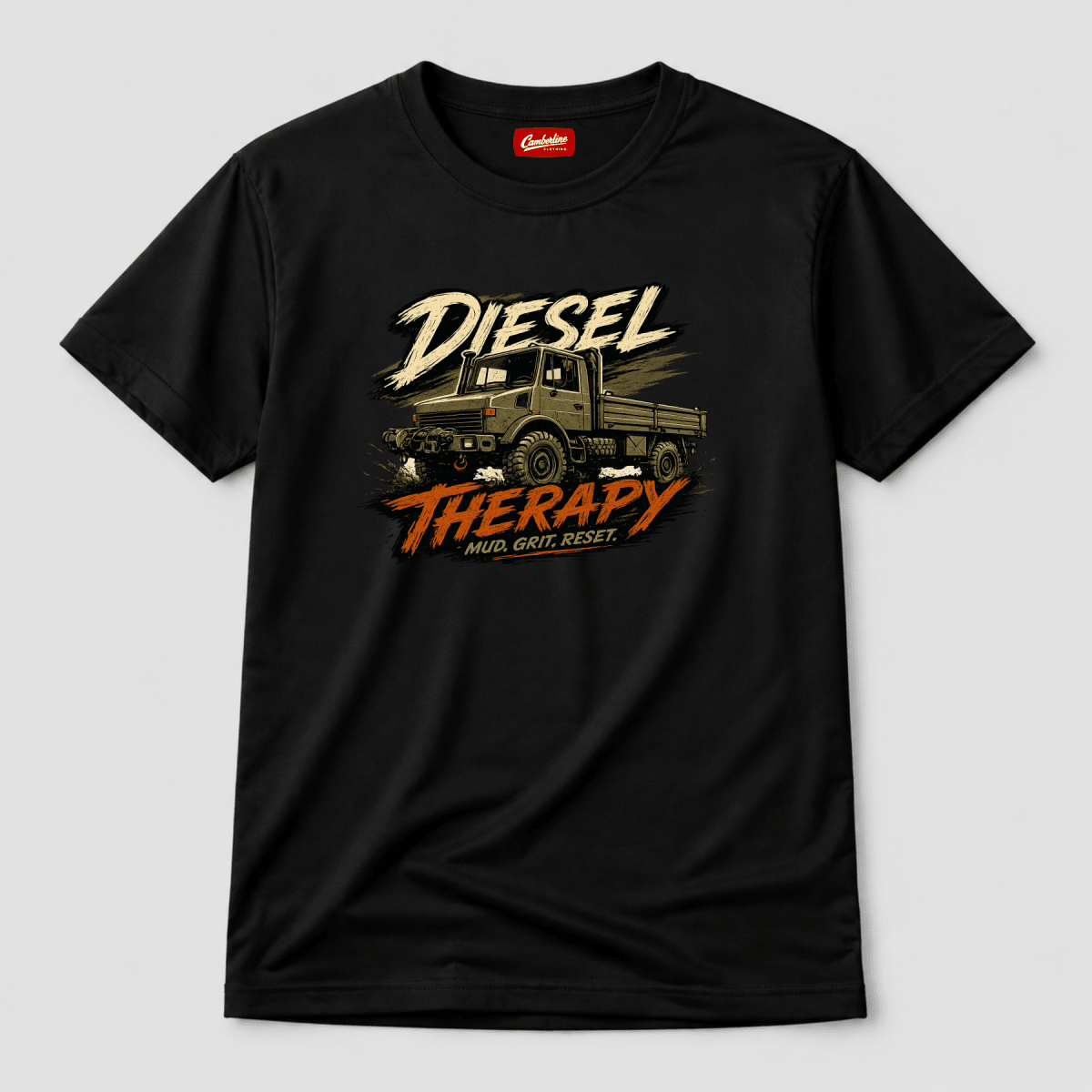 Black t-shirt with graphic design of a truck and text 'Diesel Therapy' on a light gray background