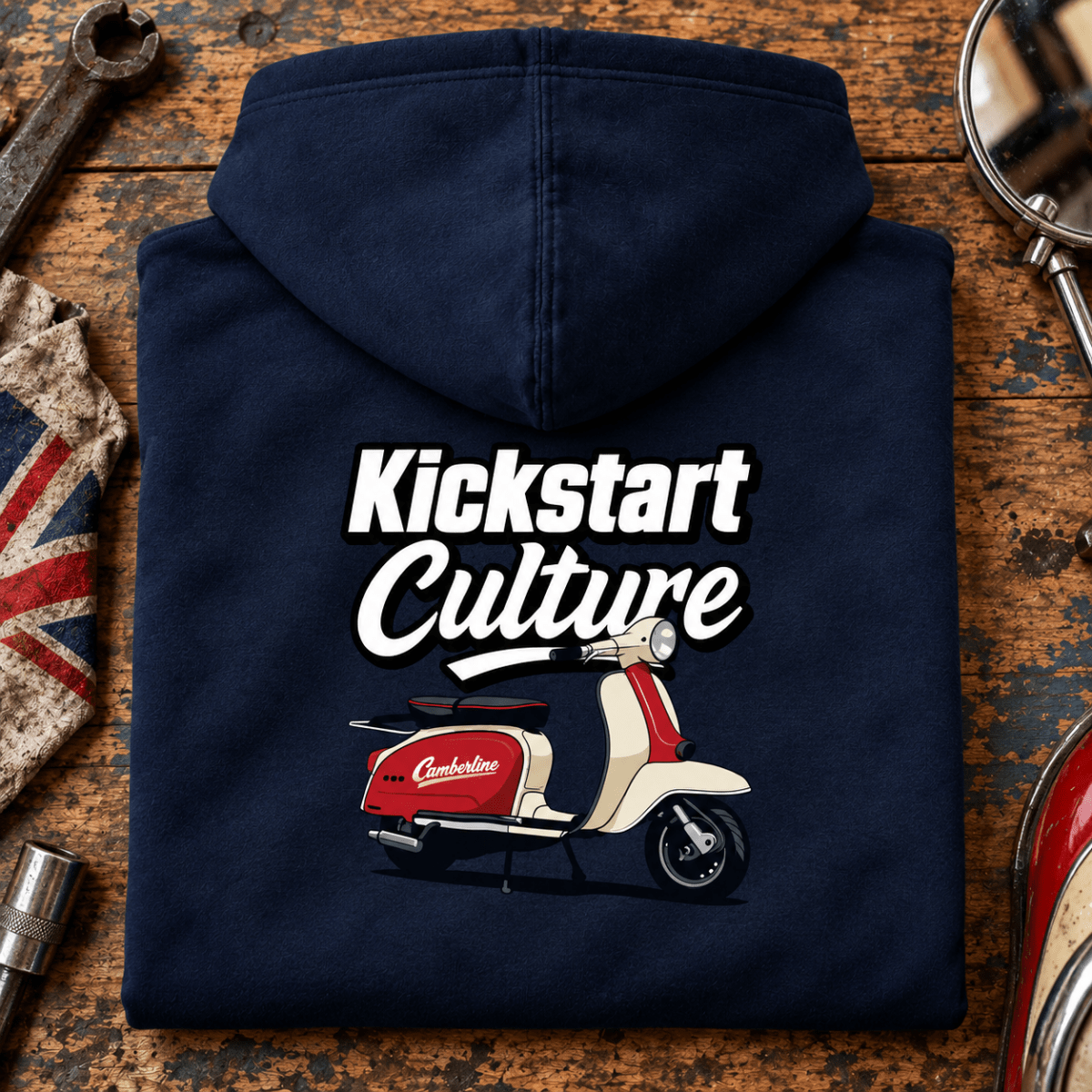 Camberline Kickstart Culture classic scooter navy hoodie back print in a British mod repair-bay setting