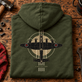 Lancaster Bomber Top View hoodie in Military Green, folded on a workshop bench, showing the back print