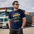 Man wearing a Navy blue t-shirt featuring a retro red and teal cab-over lorry graphic with the text Load Warrior and Haulin' Heavy Since Day One.