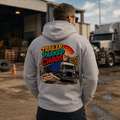 Camberline Trailer Parked Chaos grey hoodie worn by male model at haulage depot, back view showing full comic-style artic truck graphic