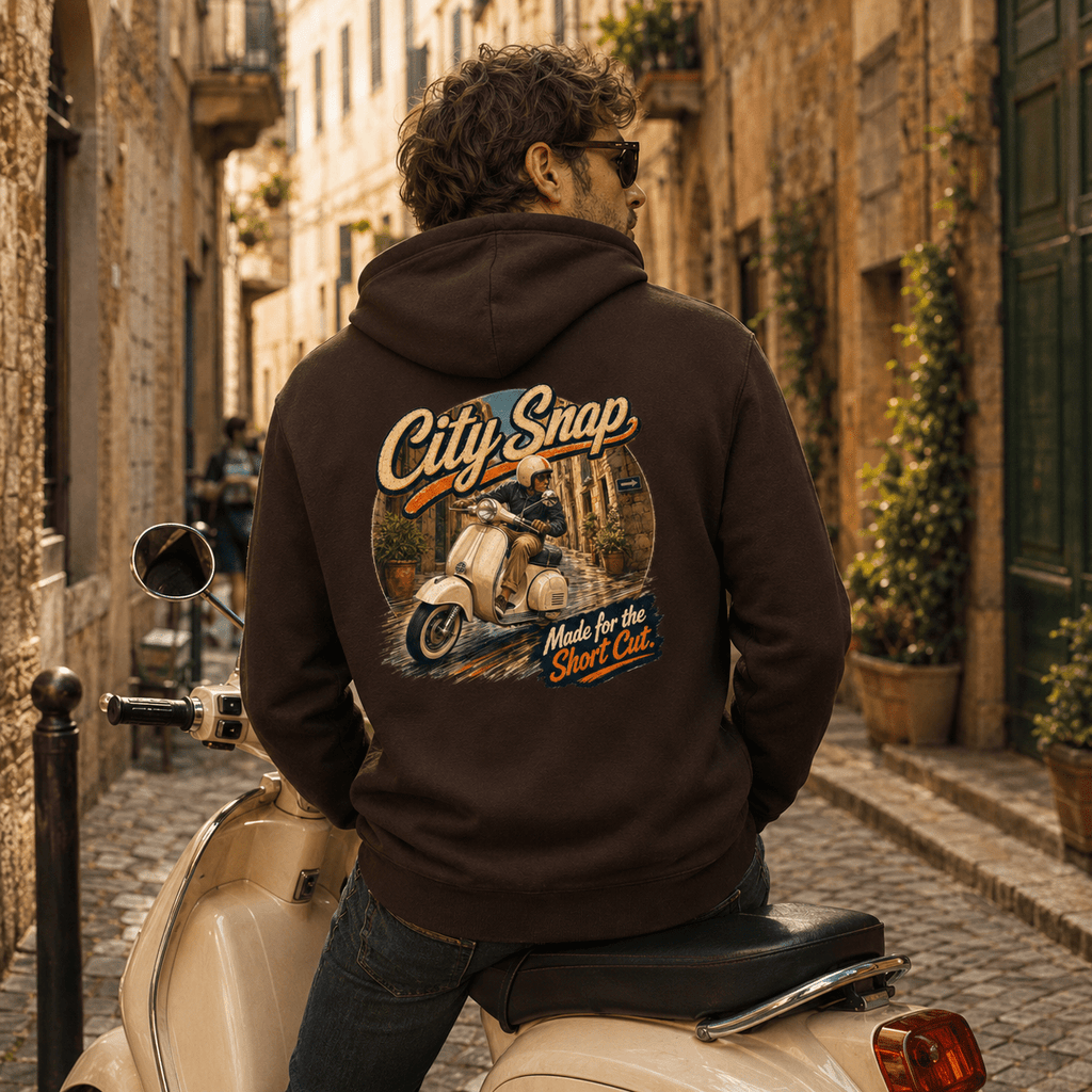 Model wearing the Camberline City Snap Mod Scooter Hoodie with riders graphic clothing design