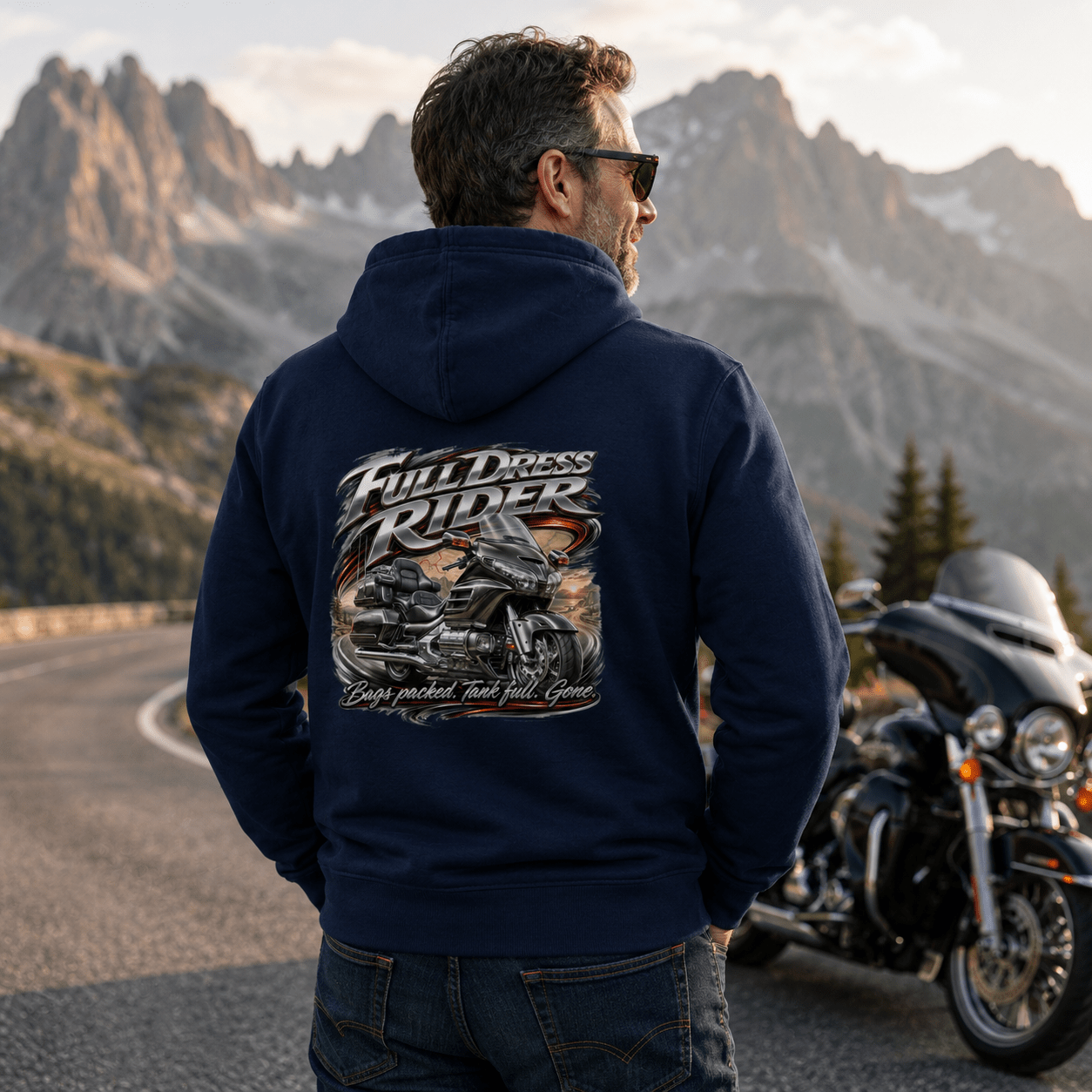 Model wearing the Camberline Riders Full Dress Rider Touring Motorcycle Hoodie – Navy, showing the Riders back graphic in a motorcycle-inspired setting