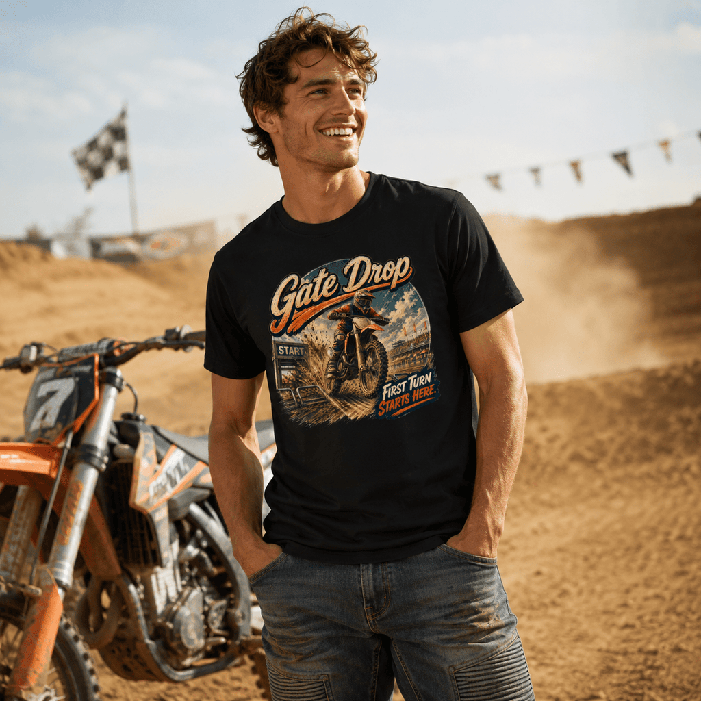 Model wearing the Camberline Riders Gate Drop Motocross Dirt Bike T-Shirt – Black, showing the Riders front graphic in a motorcycle-inspired setting