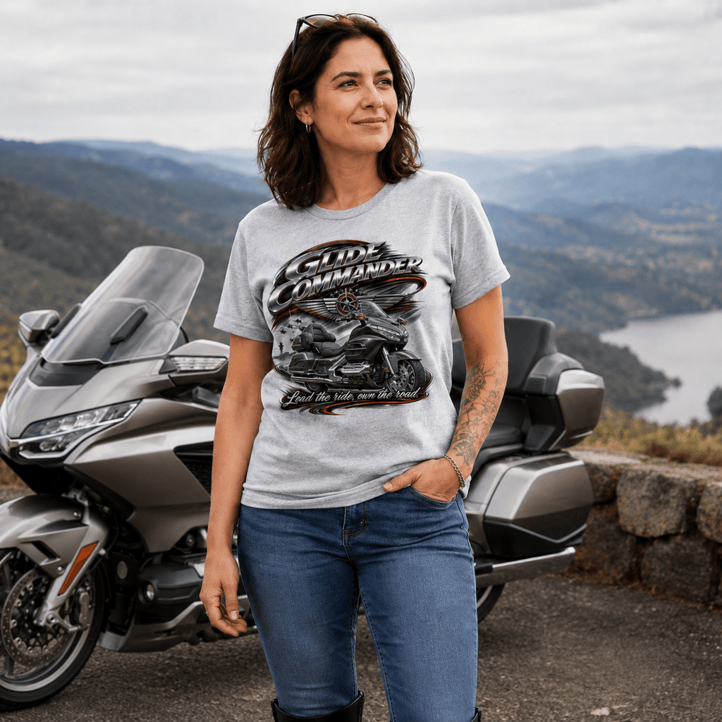 Model wearing the Camberline Riders Glide Commander Luxury Tourer T-Shirt – Grey, showing the Riders front graphic in a motorcycle-inspired setting