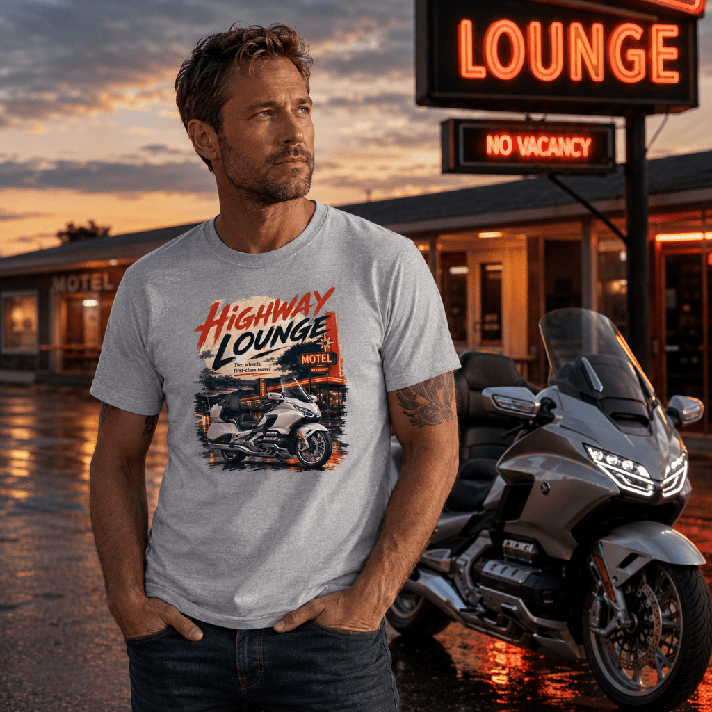 Model wearing the Camberline Riders Highway Lounge Touring Motorcycle T-Shirt – Sport Grey, showing the Camberline Riders graphic in a motorcycle-inspired setting