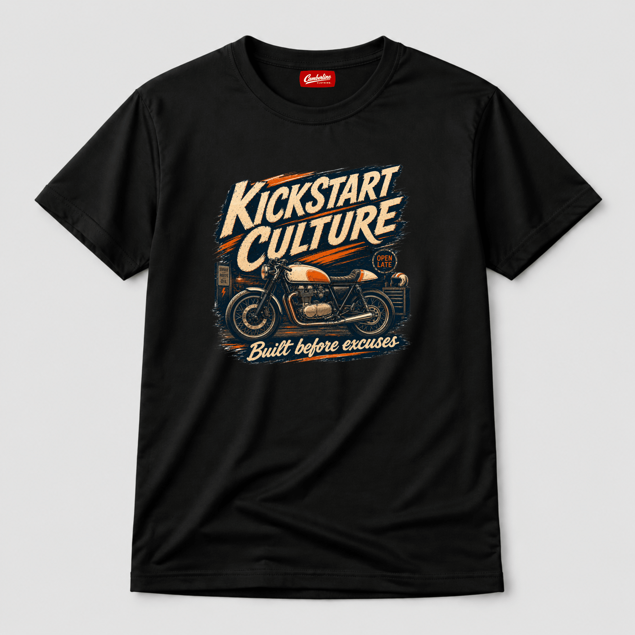 Camberline Riders Kickstart Culture Café Racer T-Shirt in Black — front view showing vintage motorcycle graphic with "Built Before Excuses" tagline and Camberline neck label