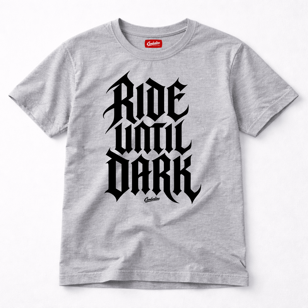 Camberline Riders Ride Until Dark Gothic Typography T-Shirt – Grey — front view showing the Camberline Riders Ride Until Dark Gothic Typography graphic print