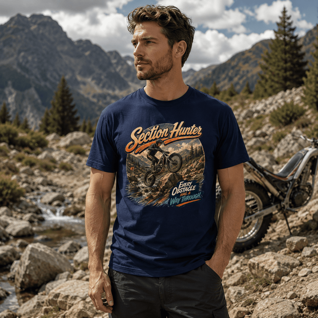 Model wearing the Camberline Riders Section Hunter Trials Bike T-Shirt – Navy, showing the Camberline Riders graphic in a motorcycle-inspired setting