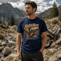 Model wearing the Camberline Riders Section Hunter Trials Bike T-Shirt – Navy, showing the Camberline Riders graphic in a motorcycle-inspired setting